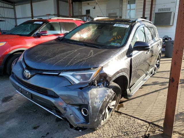 Photo 2 from auction – 2017 TOYOTA RAV4 XLE with VIN JTMRFREV7HJ702711
