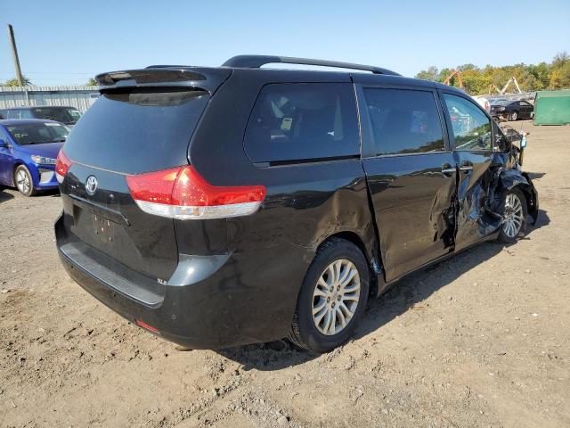 Photo 4 from auction – 2014 TOYOTA SIENNA XLE with VIN 5TDYK3DC6ES464448