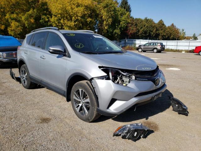 TOYOTA RAV4 LE 2018 with VIN 2T3ZFREV5JW494822 - Photo from auction