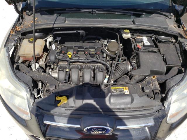 Photo 11 from auction – 2014 FORD FOCUS SE with VIN 1FADP3F29EL159893