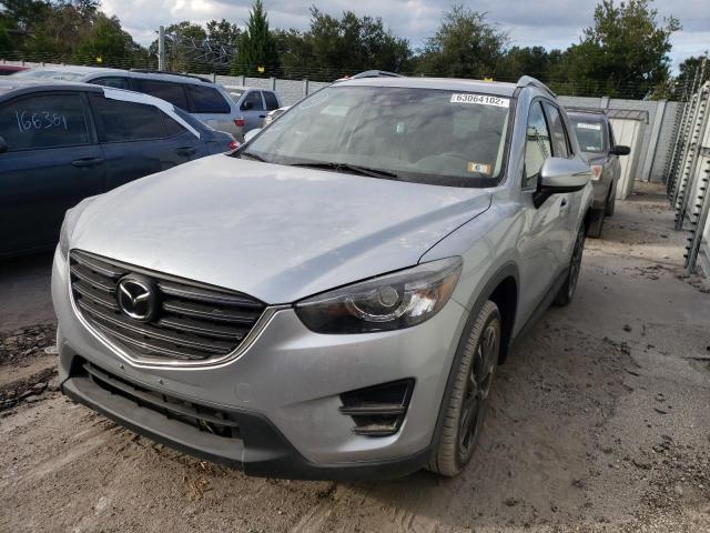 Photo 2 from auction – 2016 MAZDA CX-5 GT with VIN JM3KE4DYXG0879915
