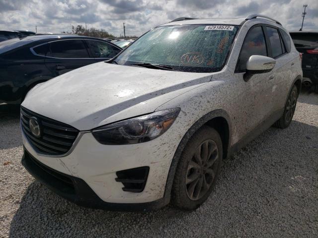 Photo 2 from auction – 2016 MAZDA CX-5 GT with VIN JM3KE2DY5G0605137