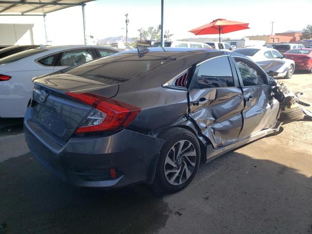 Photo 4 from auction – 2018 HONDA CIVIC EX with VIN 19XFC2F75JE015149