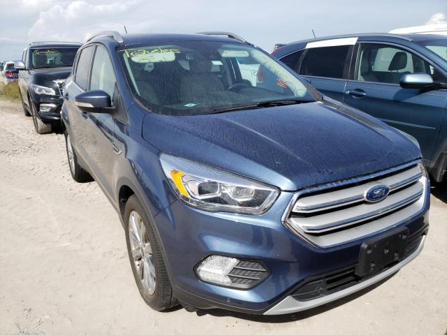 FORD ESCAPE TIT 2018 with VIN 1FMCU0J91JUA66531 - Photo from auction