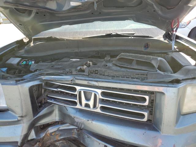 Photo 7 from auction – 2006 HONDA RIDGELINE with VIN 2HJYK16586H521604