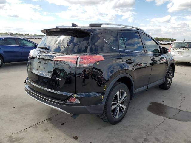 Photo 4 from auction – 2016 TOYOTA RAV4 XLE with VIN 2T3WFREV0GW276573