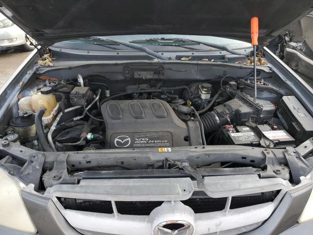 Photo 7 from auction – 2004 MAZDA TRIBUTE ES with VIN 4F2CZ96124KM30517