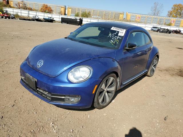 Photo 2 from auction – 2013 VOLKSWAGEN BEETLE TUR with VIN 3VWVA7AT3DM620877