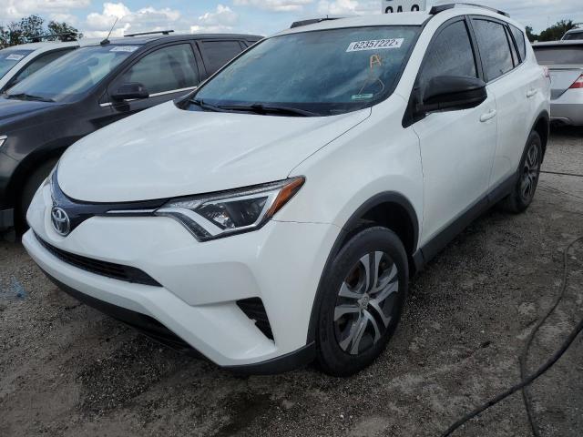 Photo 2 from auction – 2016 TOYOTA RAV4 LE with VIN JTMZFREV4GJ075688