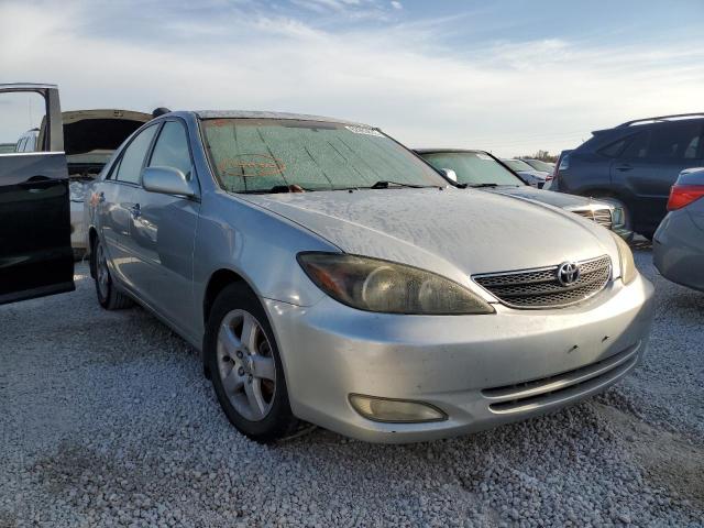 TOYOTA CAMRY LE 2004 with VIN 4T1BE32K64U808163 - Photo from auction
