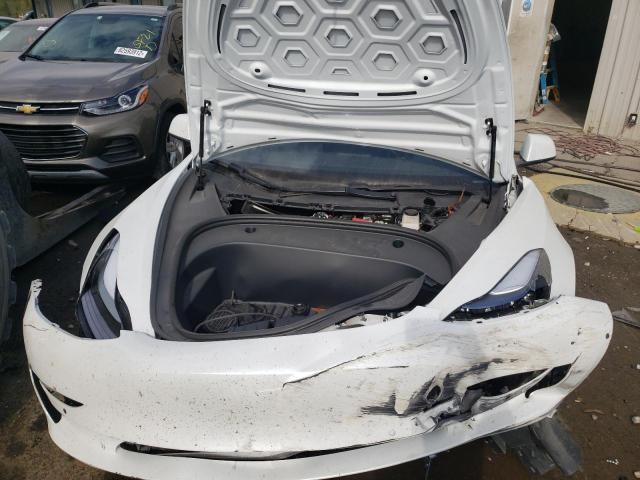 Photo 7 from auction – 2021 TESLA MODEL 3 with VIN 5YJ3E1EC9MF050023