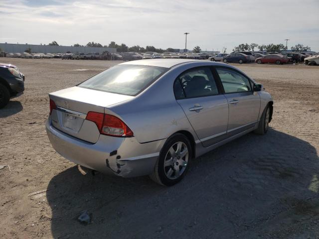 Photo 4 from auction – 2011 HONDA CIVIC LX with VIN 19XFA1F51BE031459