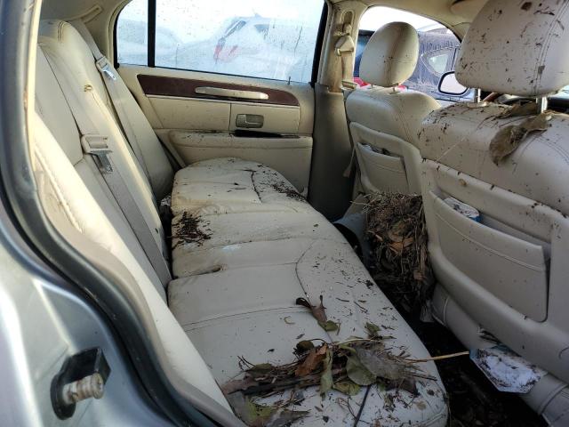 Photo 6 from auction – 2004 LINCOLN TOWN CAR U with VIN 1LNHM83W04Y658328