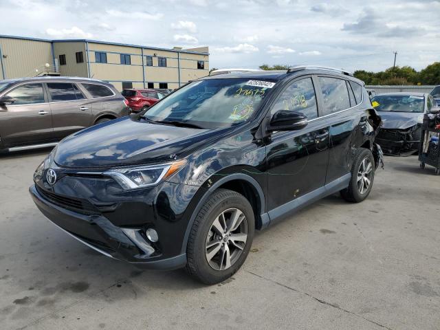 Photo 2 from auction – 2016 TOYOTA RAV4 XLE with VIN 2T3WFREV0GW276573