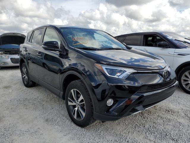 TOYOTA RAV4 ADVEN 2018 with VIN 2T3WFREV2JW411222 - Photo from auction
