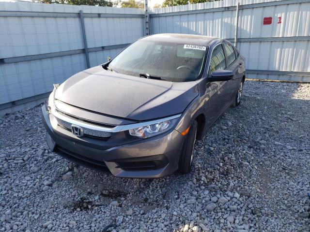 Photo 2 from auction – 2017 HONDA CIVIC LX with VIN 2HGFC2F51HH564300