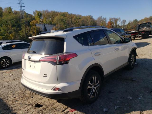 Photo 4 from auction – 2017 TOYOTA RAV4 LE with VIN JTMBFREV3HJ154031