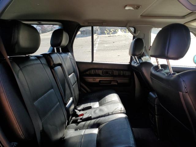Photo 6 from auction – 2002 INFINITI QX4 with VIN JNRDR09Y12W256387