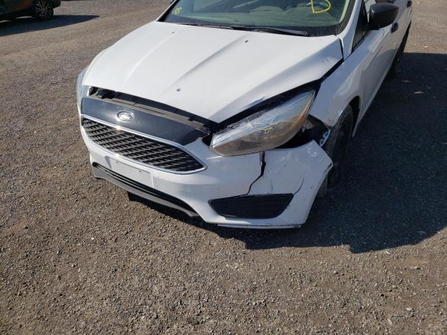 Photo 9 from auction – 2015 FORD FOCUS S with VIN 1FADP3E23FL225146