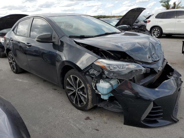 TOYOTA COROLLA L 2017 with VIN 5YFBURHE1HP658591 - Photo from auction