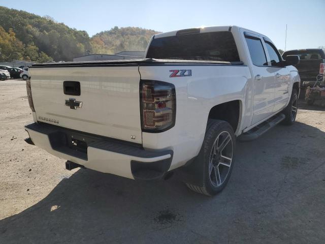 Photo 4 from auction – 2018 CHEVROLET SILVERADO with VIN 3GCUKREC7JG517909