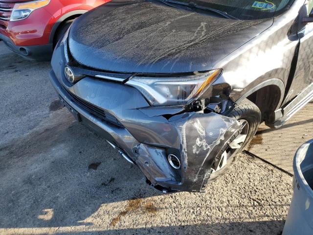 Photo 9 from auction – 2017 TOYOTA RAV4 XLE with VIN JTMRFREV7HJ702711