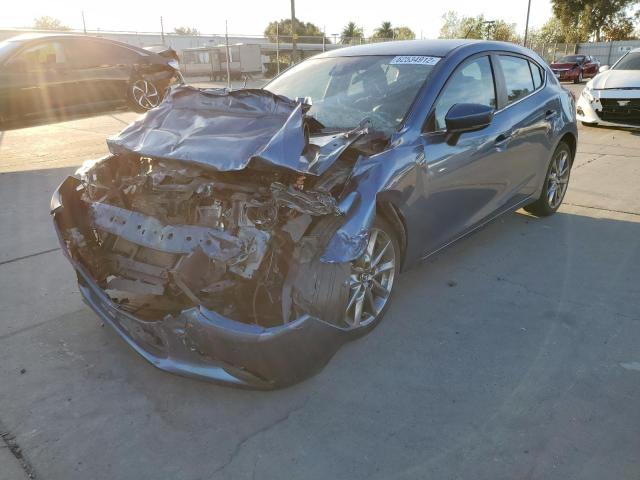 Photo 2 from auction – 2018 MAZDA 3 TOURING with VIN 3MZBN1L37JM187089