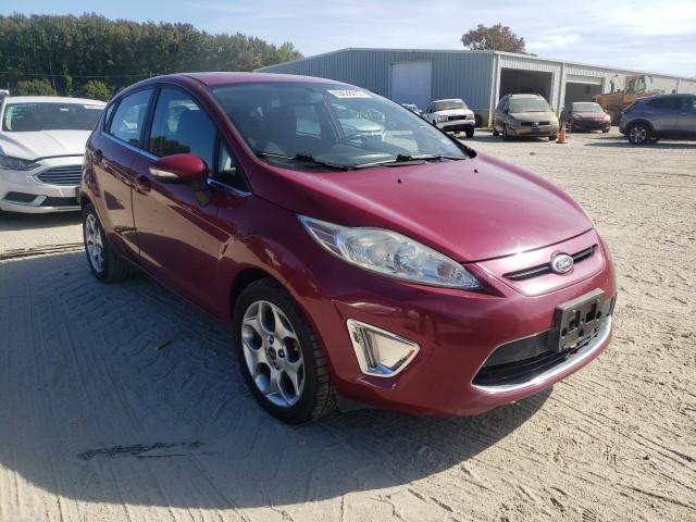 FORD FIESTA SES 2011 with VIN 3FADP4FJ1BM161919 - Photo from auction