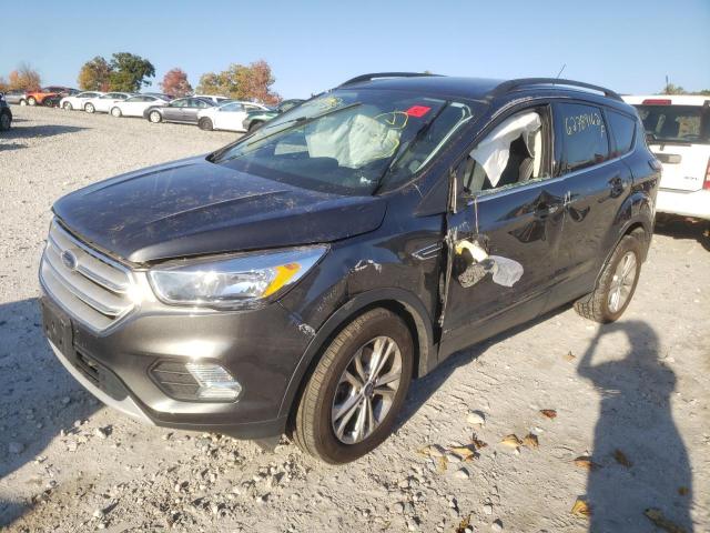 Photo 2 from auction – 2018 FORD ESCAPE SE with VIN 1FMCU9GD6JUC99210