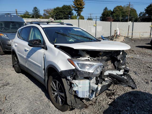TOYOTA RAV4 XLE 2017 with VIN JTMRFREV1HJ116795 - Photo from auction