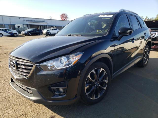 Photo 2 from auction – 2016 MAZDA CX-5 GT with VIN JM3KE4DY6G0888465