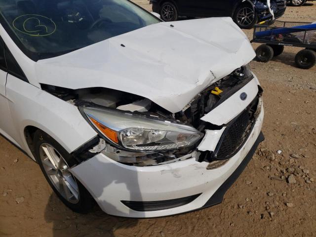 Photo 9 from auction – 2015 FORD FOCUS SE with VIN 1FADP3F26FL365349