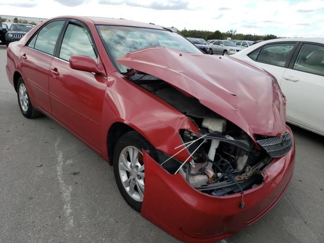 TOYOTA CAMRY LE 2004 with VIN 4T1BF32K44U584940 - Photo from auction