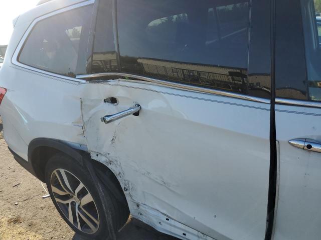 Photo 9 from auction – 2017 HONDA PILOT TOUR with VIN 5FNYF6H92HB017256