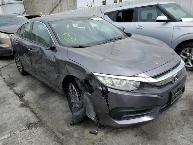 HONDA CIVIC EX 2018 with VIN 2HGFC2F70JH535796 - Photo from auction