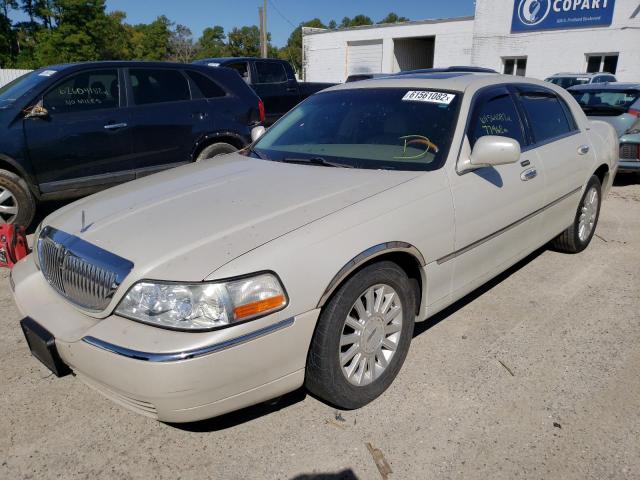 Photo 2 from auction – 2004 LINCOLN TOWN CAR U with VIN 1LNHM83W74Y648069