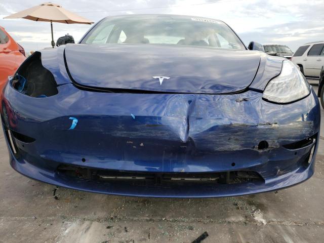 Photo 5 from auction – 2022 TESLA MODEL 3 with VIN 5YJ3E1EA2NF304400