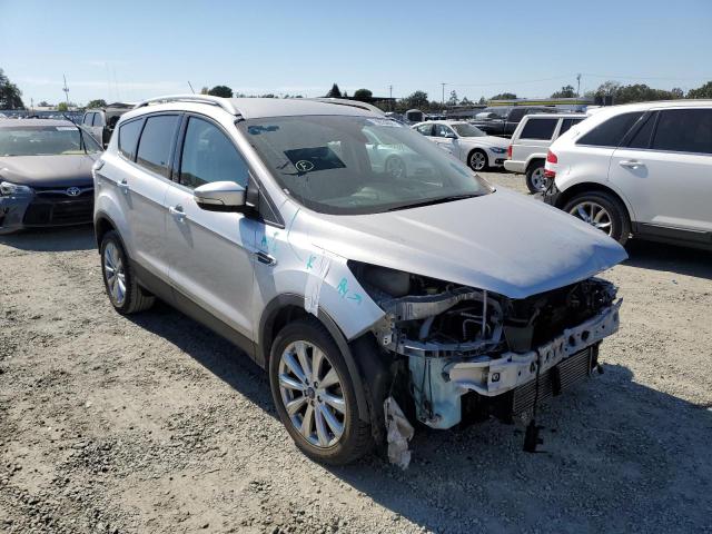 FORD ESCAPE TIT 2017 with VIN 1FMCU0J99HUA63208 - Photo from auction
