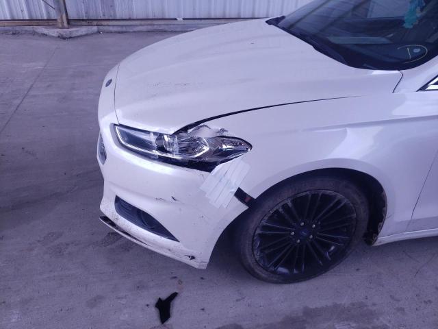 Photo 9 from auction – 2014 FORD FUSION SE with VIN 3FA6P0HD7ER242780