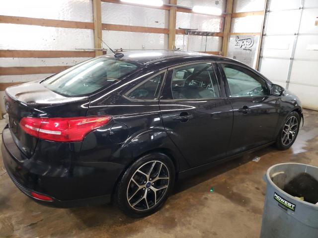 Photo 4 from auction – 2018 FORD FOCUS SEL with VIN 1FADP3H25JL320358