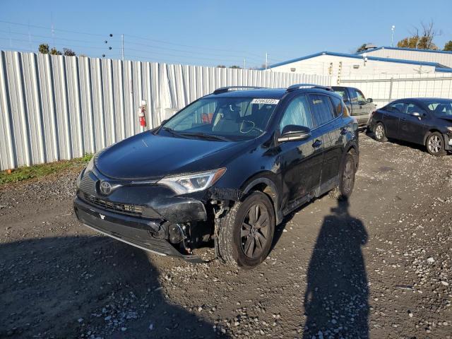 Photo 2 from auction – 2017 TOYOTA RAV4 XLE with VIN 2T3WFREV3HW330918