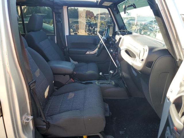Photo 5 from auction – 2011 JEEP WRANGLER U with VIN 1J4BA5H15BL561158