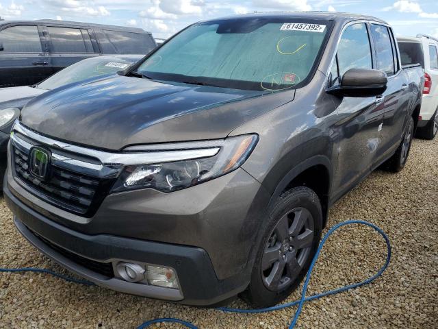 Photo 2 from auction – 2020 HONDA RIDGELINE with VIN 5FPYK3F70LB001892