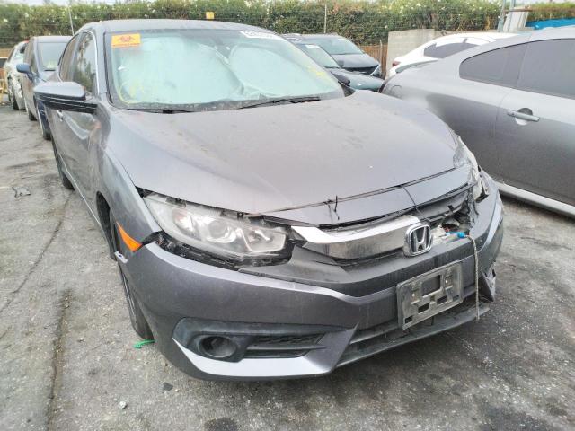 Photo 9 from auction – 2016 HONDA CIVIC LX with VIN 19XFC2F56GE204318
