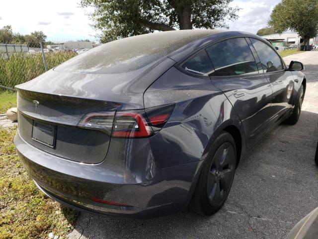 Photo 4 from auction – 2021 TESLA MODEL 3 with VIN 5YJ3E1EA5MF093823