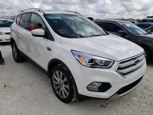 FORD ESCAPE TIT 2018 with VIN 1FMCU9J90JUD12814 - Photo from auction