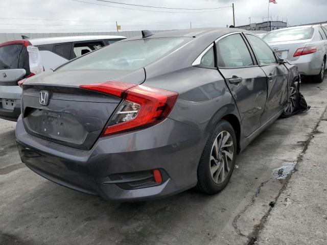 Photo 4 from auction – 2018 HONDA CIVIC EX with VIN 2HGFC2F70JH535796