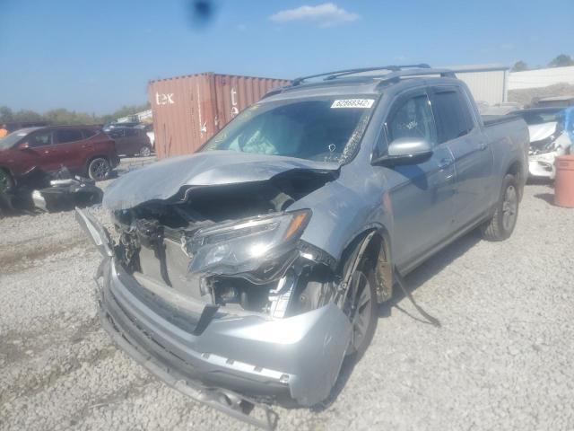 Photo 2 from auction – 2019 HONDA RIDGELINE with VIN 5FPYK3F73KB024792