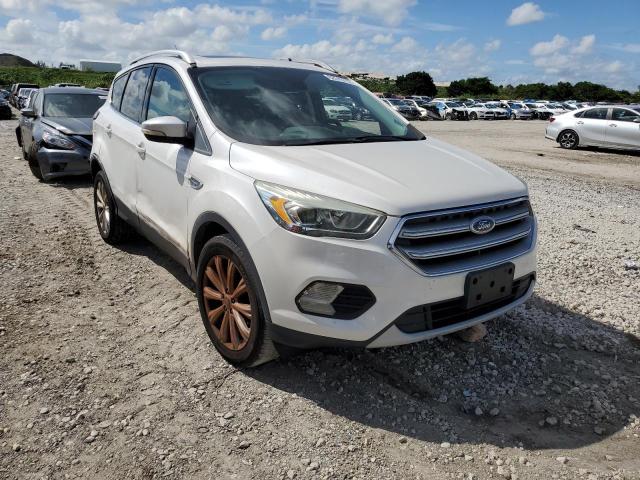 FORD ESCAPE TIT 2017 with VIN 1FMCU0J93HUB97485 - Photo from auction