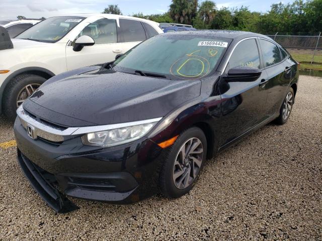 Photo 2 from auction – 2018 HONDA CIVIC EX with VIN 2HGFC2F70JH564120
